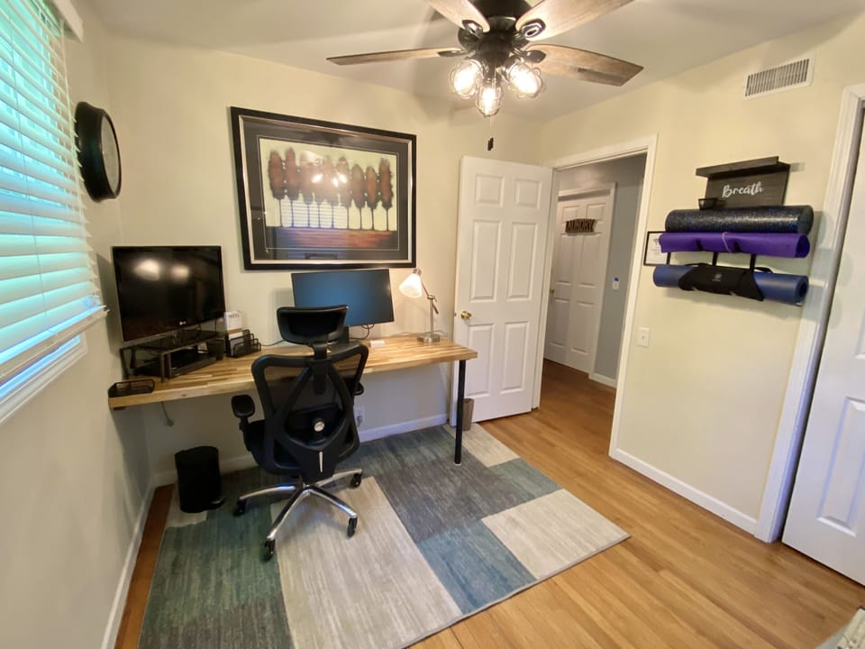 Remote Work office with Dell monitor. 
Watch TV while you work! Ergonomic chair 