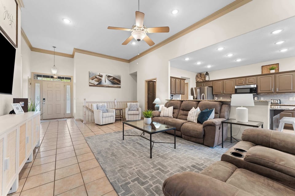 The open concept on the main floor keeps everyone together, whether cooking in the kitchen or relaxing on the couches!