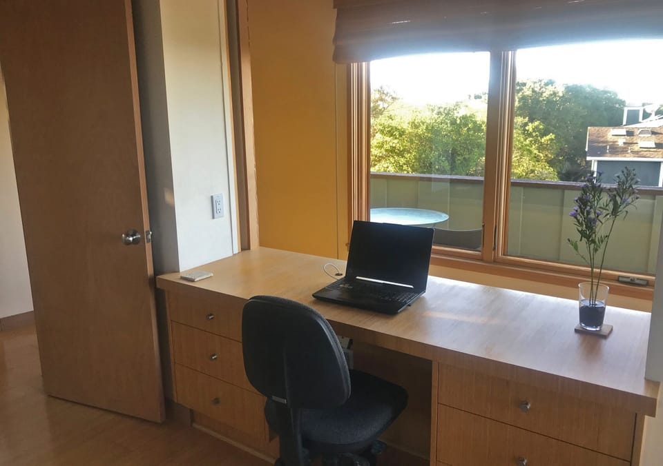 Built-in bamboo cabinetry work space with ocean/island view.