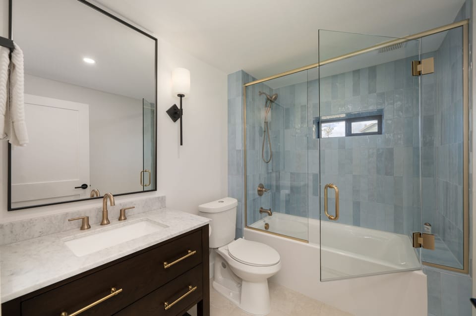Downstairs bathroom, conveniently attached to the bedroom with two queen beds.