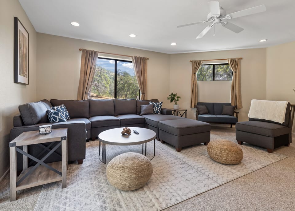 After a long day of exploring & hiking, watch 70" 4K TV under AC & ceiling fan 