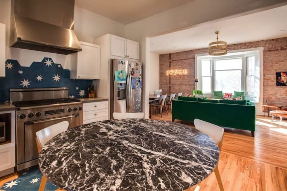  Kitchen view to the second living room and dining area.