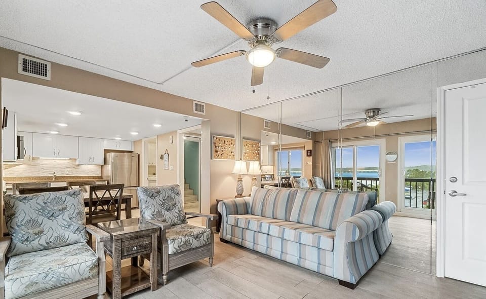 The living room with a queen sleeper offers a stunning view of Lake Powell. 