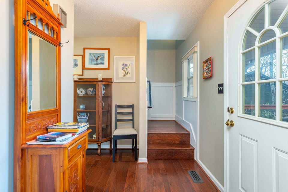 Staircase to upper-level bedrooms.