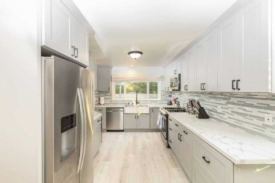 Gourmet Kitchen with top of the line appliances and cooking utensils