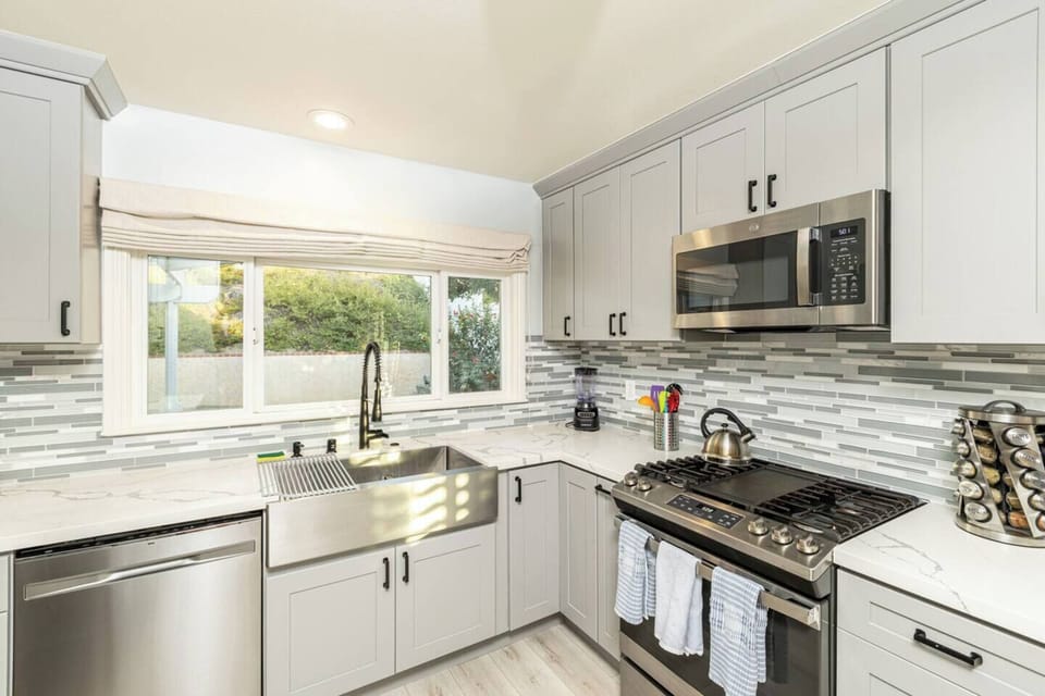 Gourmet Kitchen with top of the line appliances and cooking utensils