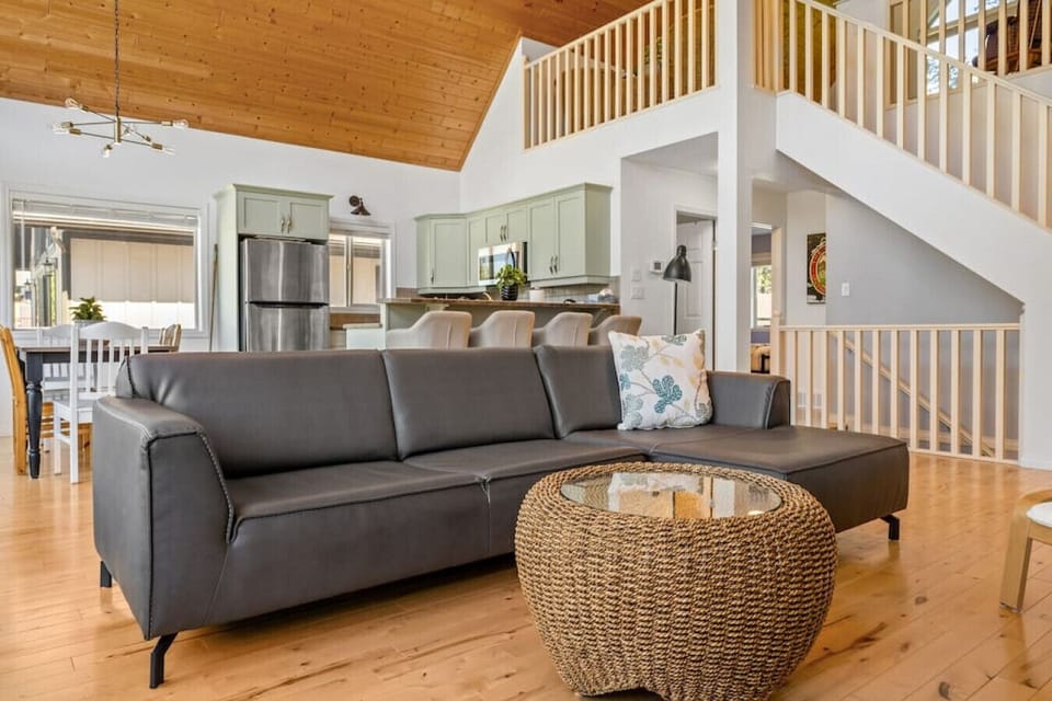 Main floor common area with a gas-lit fireplace.