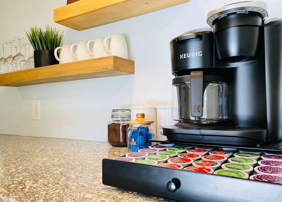 Complimentary coffee (k cups and ground coffee), tea,sweeteners and creamers. 