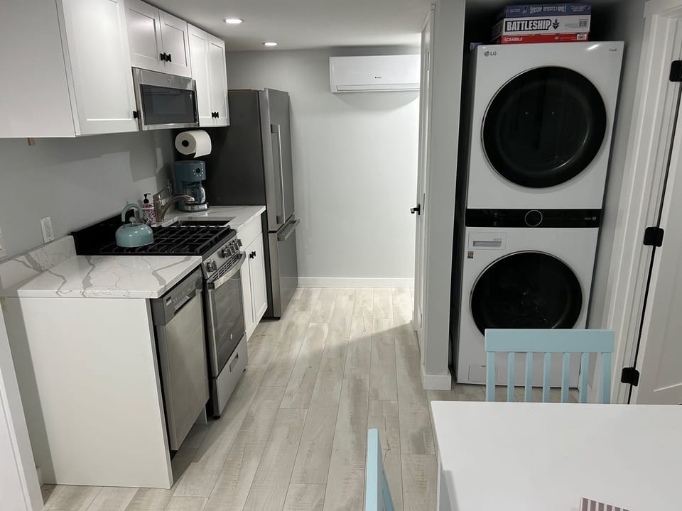 Fully equipped Kitchen with stainless steel appliances and washer and dryer