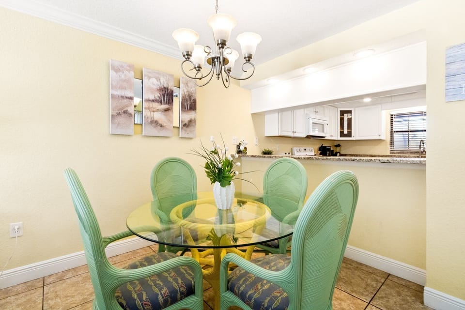 Sunlight pours into this charming dining area, making every meal feel like a special occasion.
