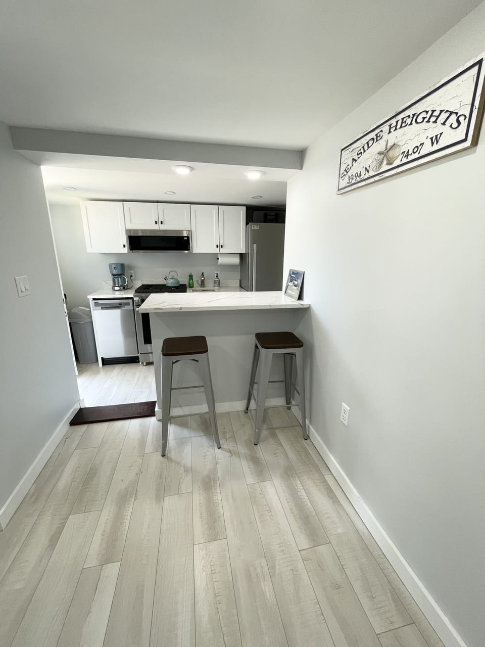 Kitchen counter island. Can serve as a dedicated workspace. 