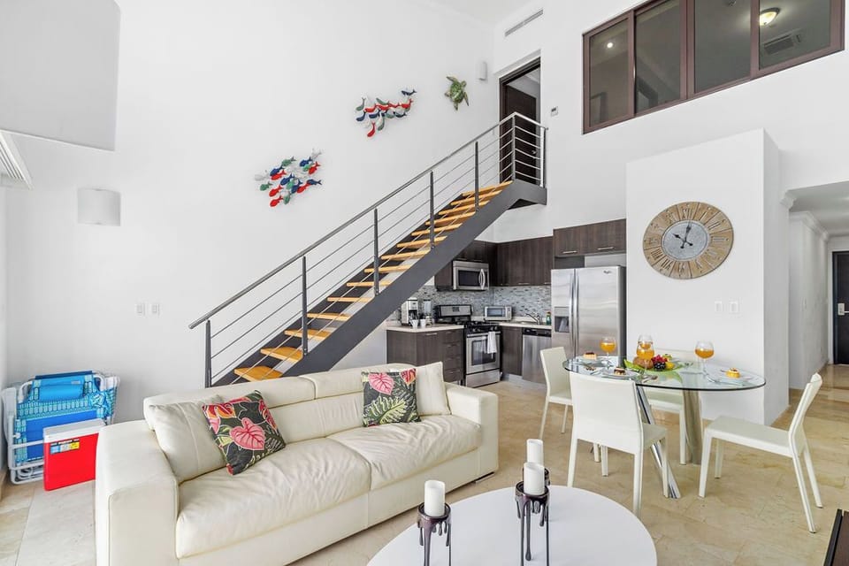 Our rental property's living room is the perfect place to unwind and make memories with loved ones. Comfort and relaxation at its finest.