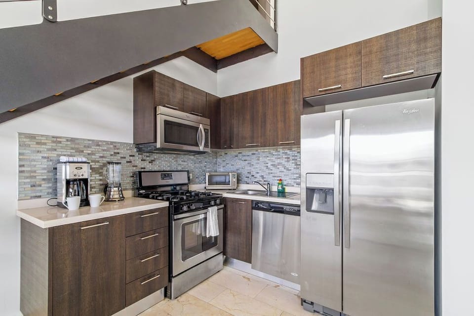 Discover the joy of home-cooked meals in our well-equipped rental property kitchen. A hub for culinary adventures and shared moments.