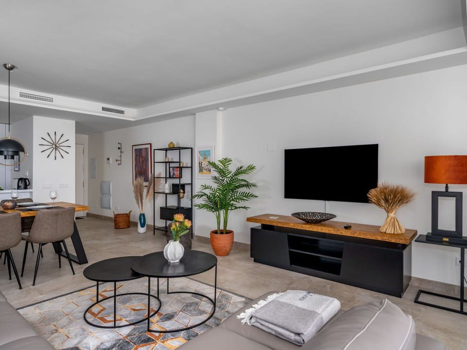 Furniture, Property, Plant, Table, Houseplant, Couch, Orange, Comfort, Interior Design, Building