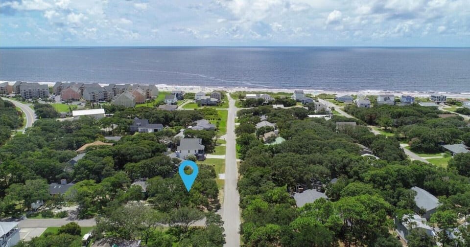 Aerial View of House to Beach