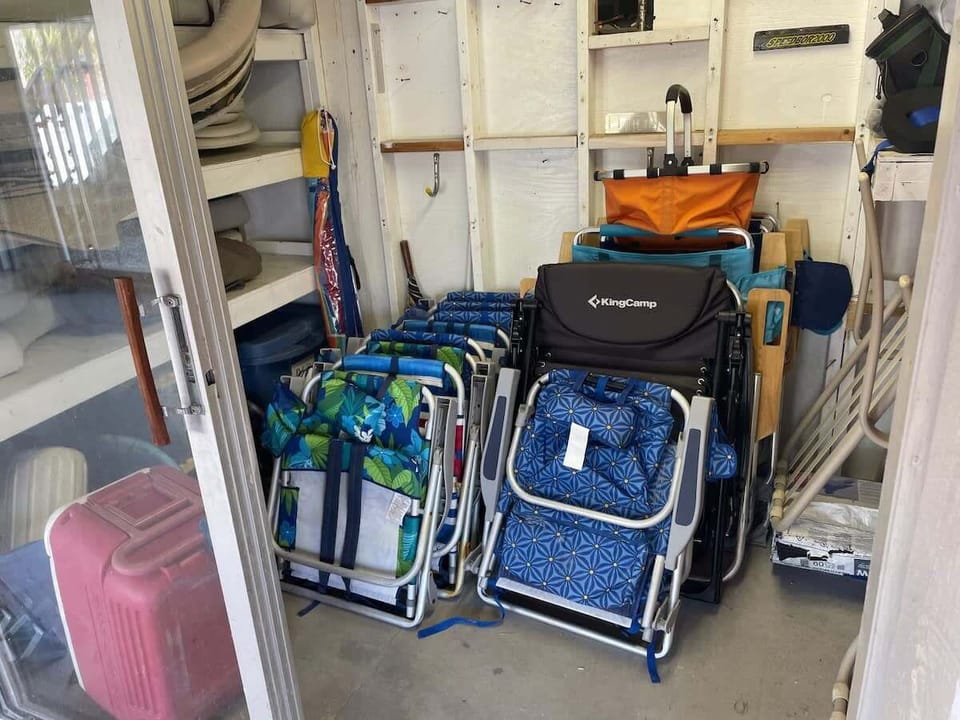 Beach gear accessible to guests in garage area
