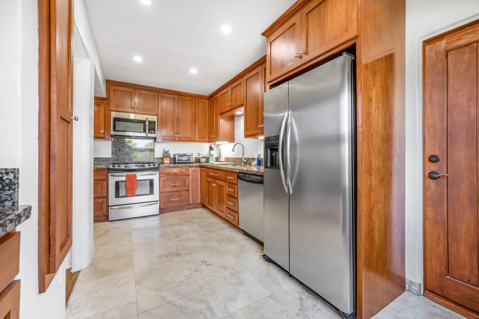 The primary kitchen is spacious and updated with stainless steel appliances!