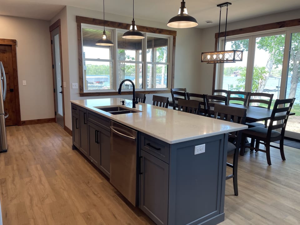 Island and dining table provide seating for 12