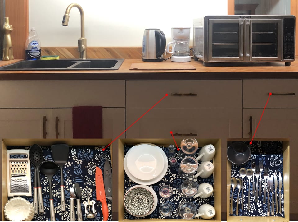 Kitchenette appliances, utensils and cutleries. 