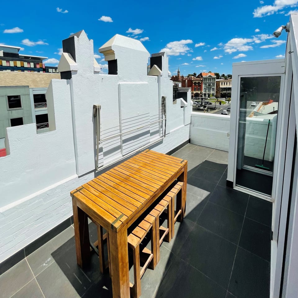 Rooftop deck with views across the City