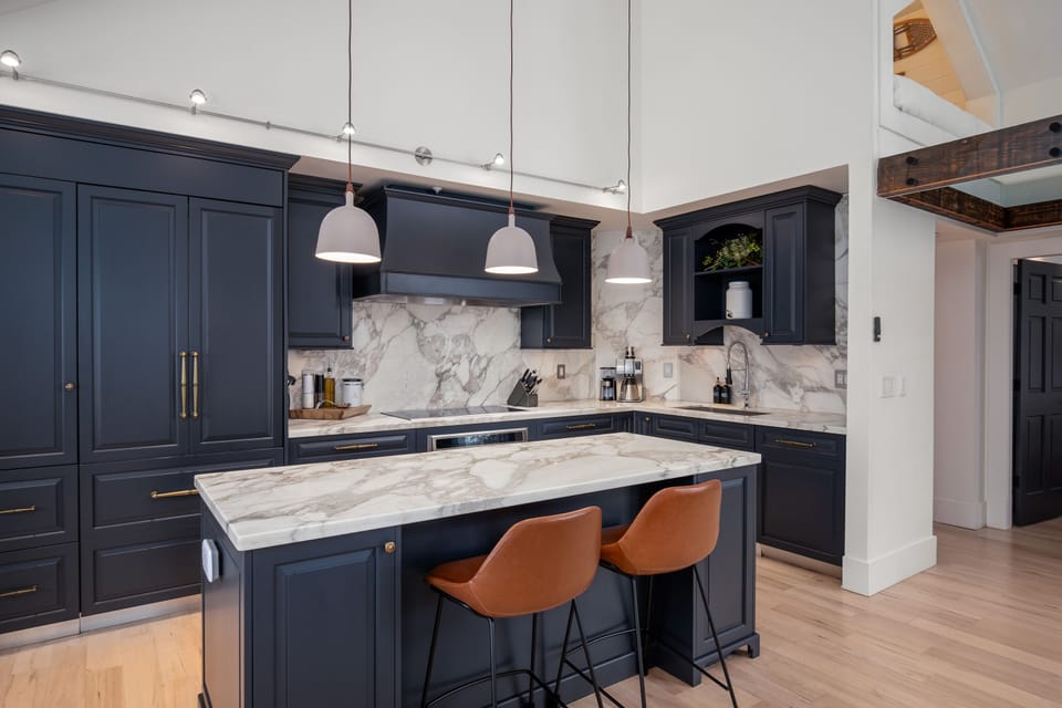 Kitchen- Fully stocked with essential appliances including dishwasher, oven, microwave and coffee maker