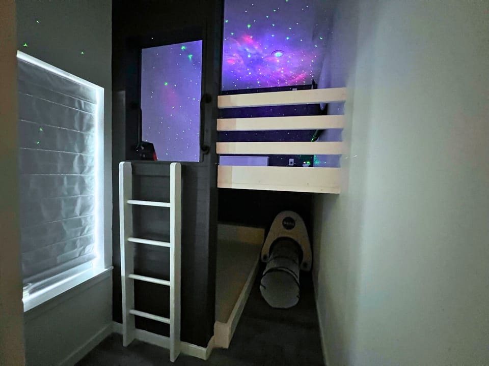 Kids will blast off into fun in this galaxy-inspired room.