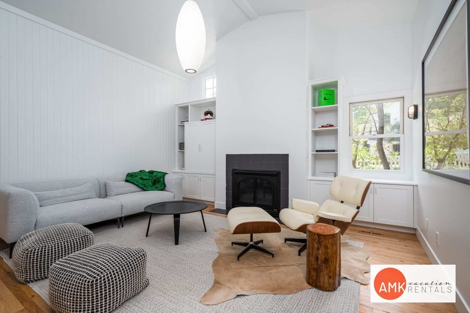 Living room with fireplace and TV