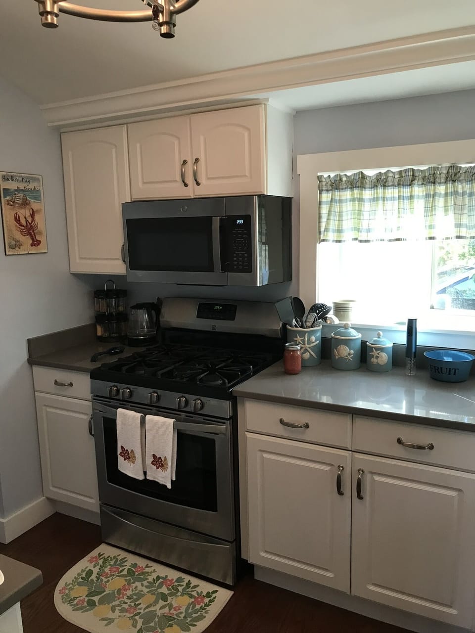 Gas stove, oven, air fryer, coffee maker.  Stackable washer/dryer to the left
