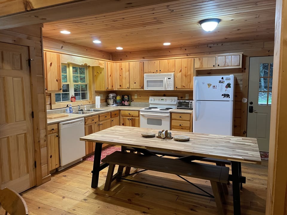 Fully equipped eat-in kitchen, table easily seats 8-10.