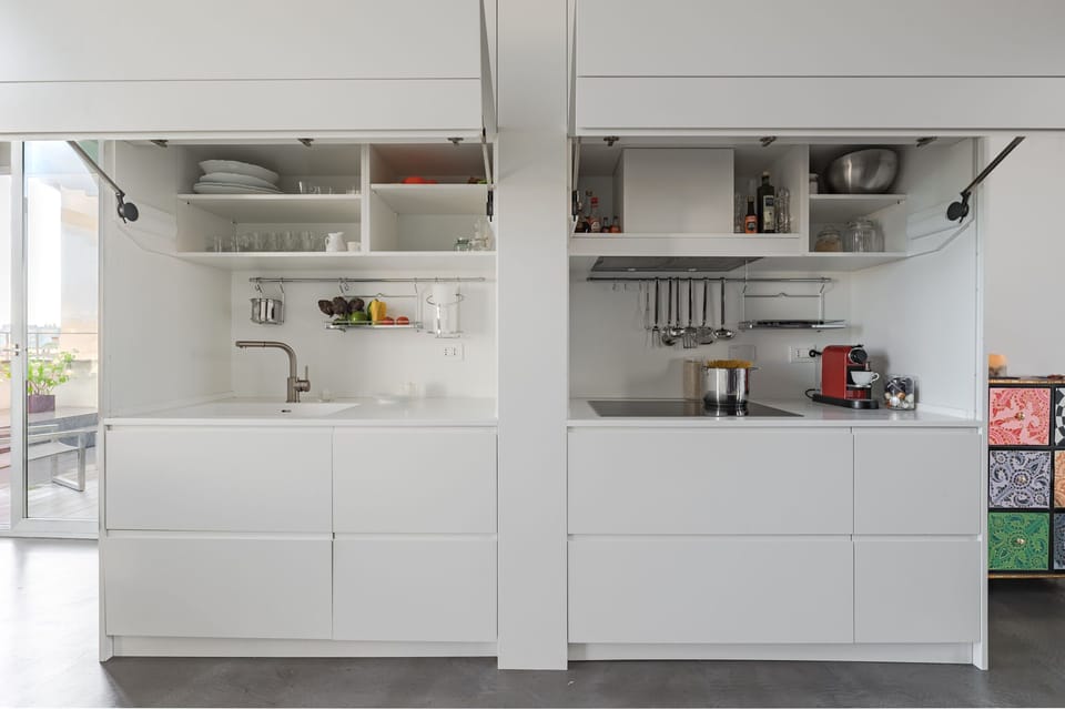 Kitchen corner with sink, induction hob, dishwasher and coffee maker 