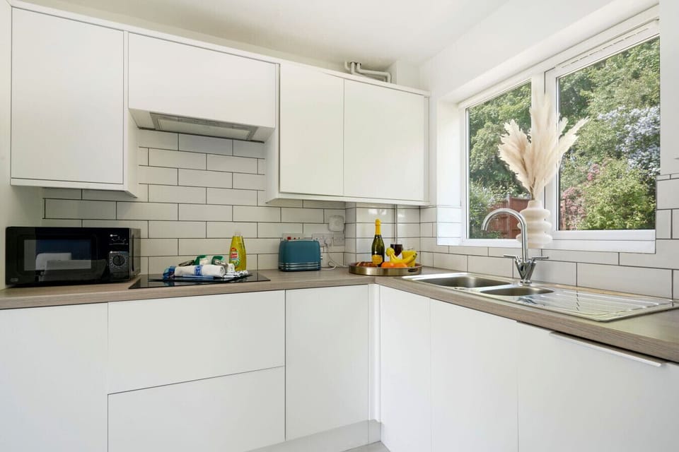 A fully equipped kitchen with everything you need to prepare and enjoy a home-cooked meal during your stay.