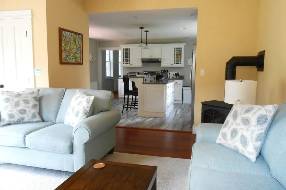 The living room is right next to the kitchen