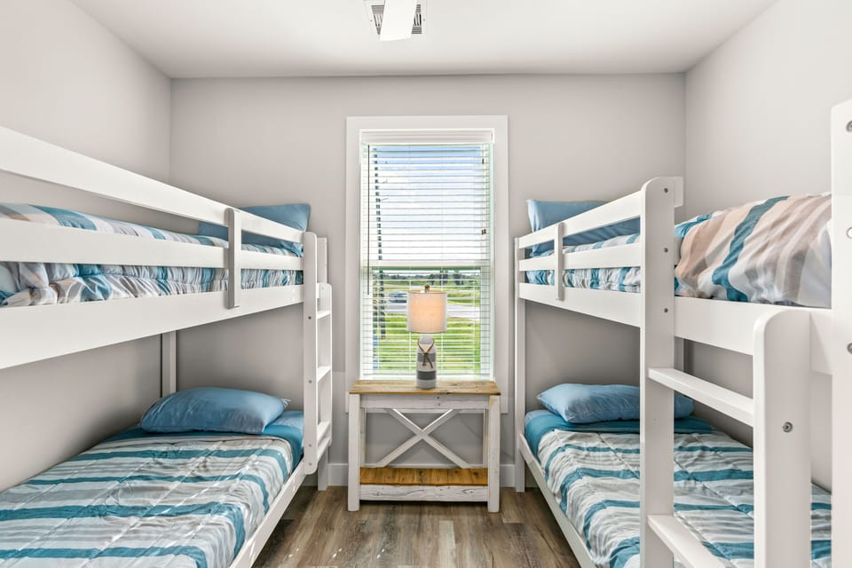 Cozy bunk beds set the scene for childhood adventures and bedtime stories!