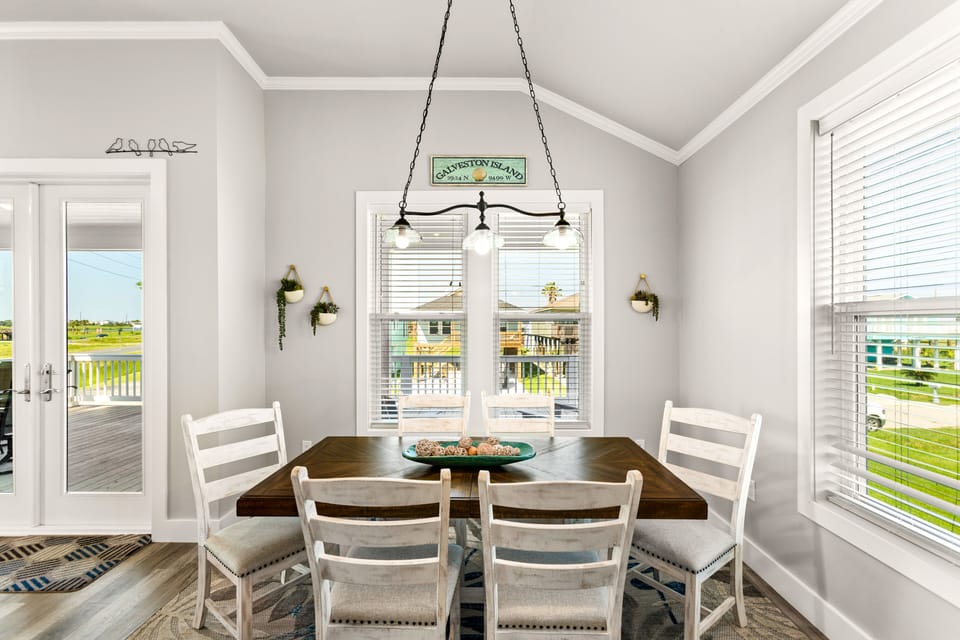 Create memories in a dining space filled with natural light from big windows!