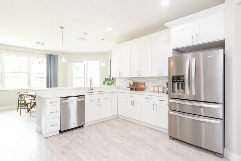 Cook and entertain in a wide, spacious, and sleek kitchen