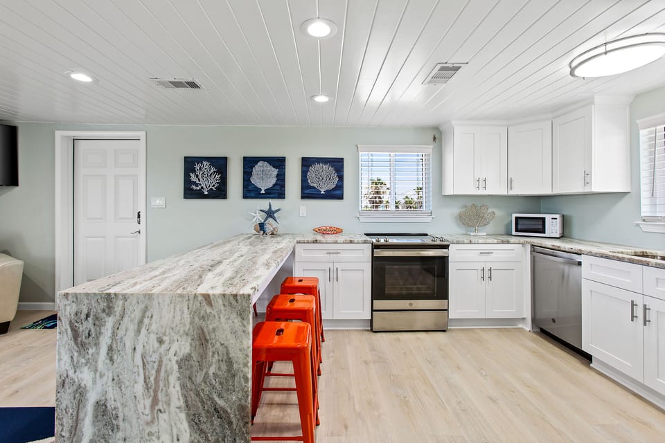 Waterfall countertop edge. No expense spared in this 100% remodeled home.