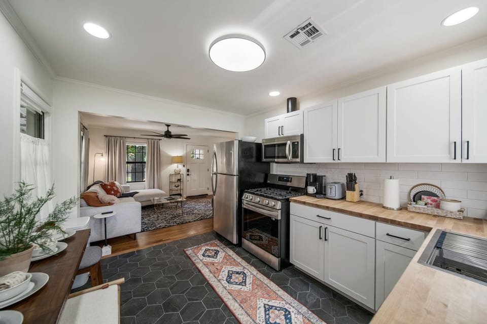 Open kitchen area with plenty of counter space for meal prep.