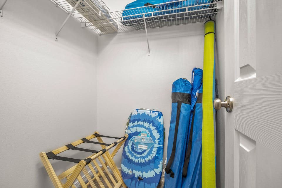 Main bedroom closet equipped with guest beach items! 