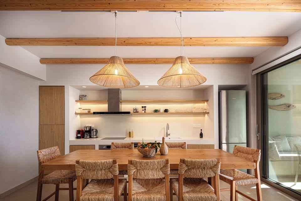 Indoor dining area for 8 adjacent to the kitchen.
