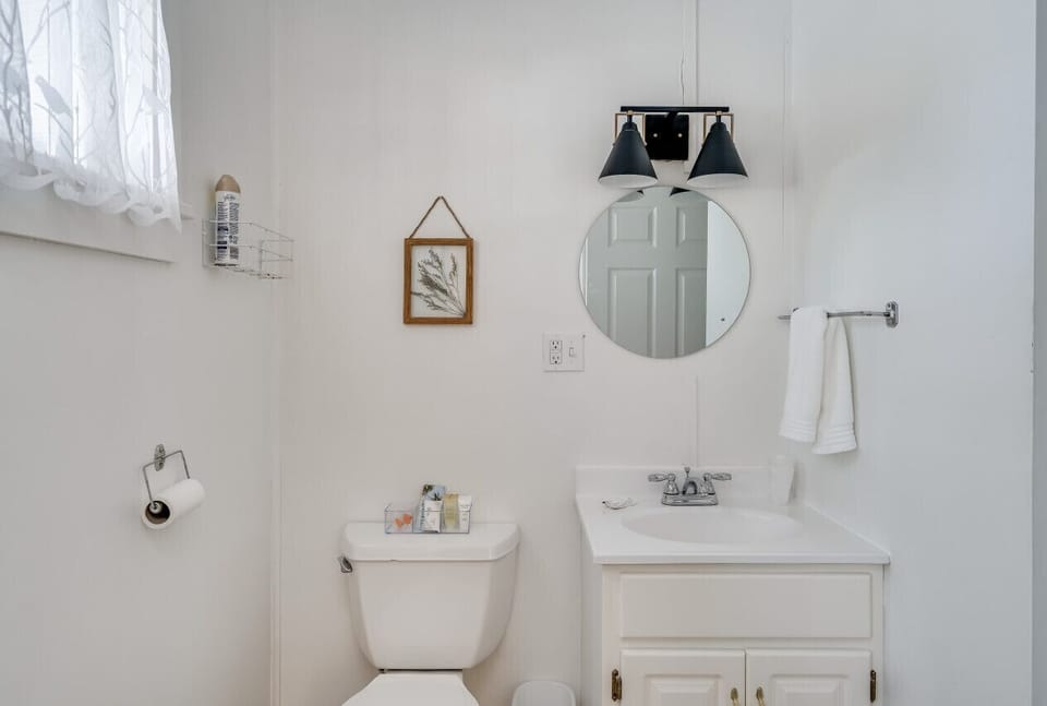 Bathroom with hair dryer provided