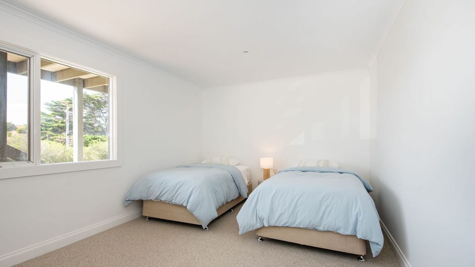 Downstairs bedroom  6 with two single beds 
