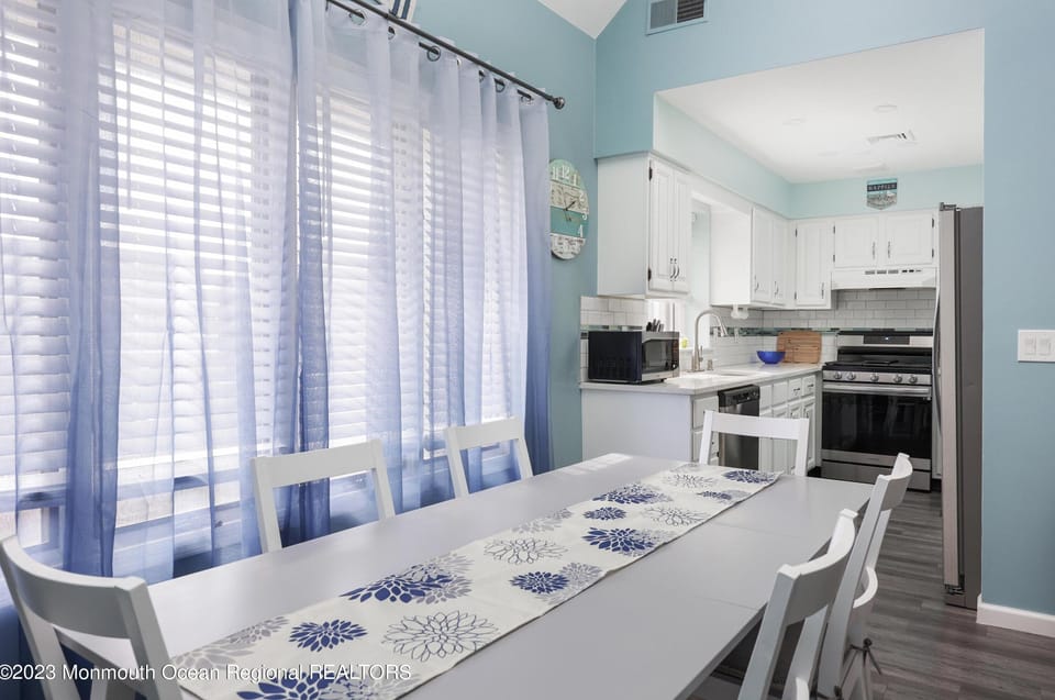 Dining Table with views of kitchen.