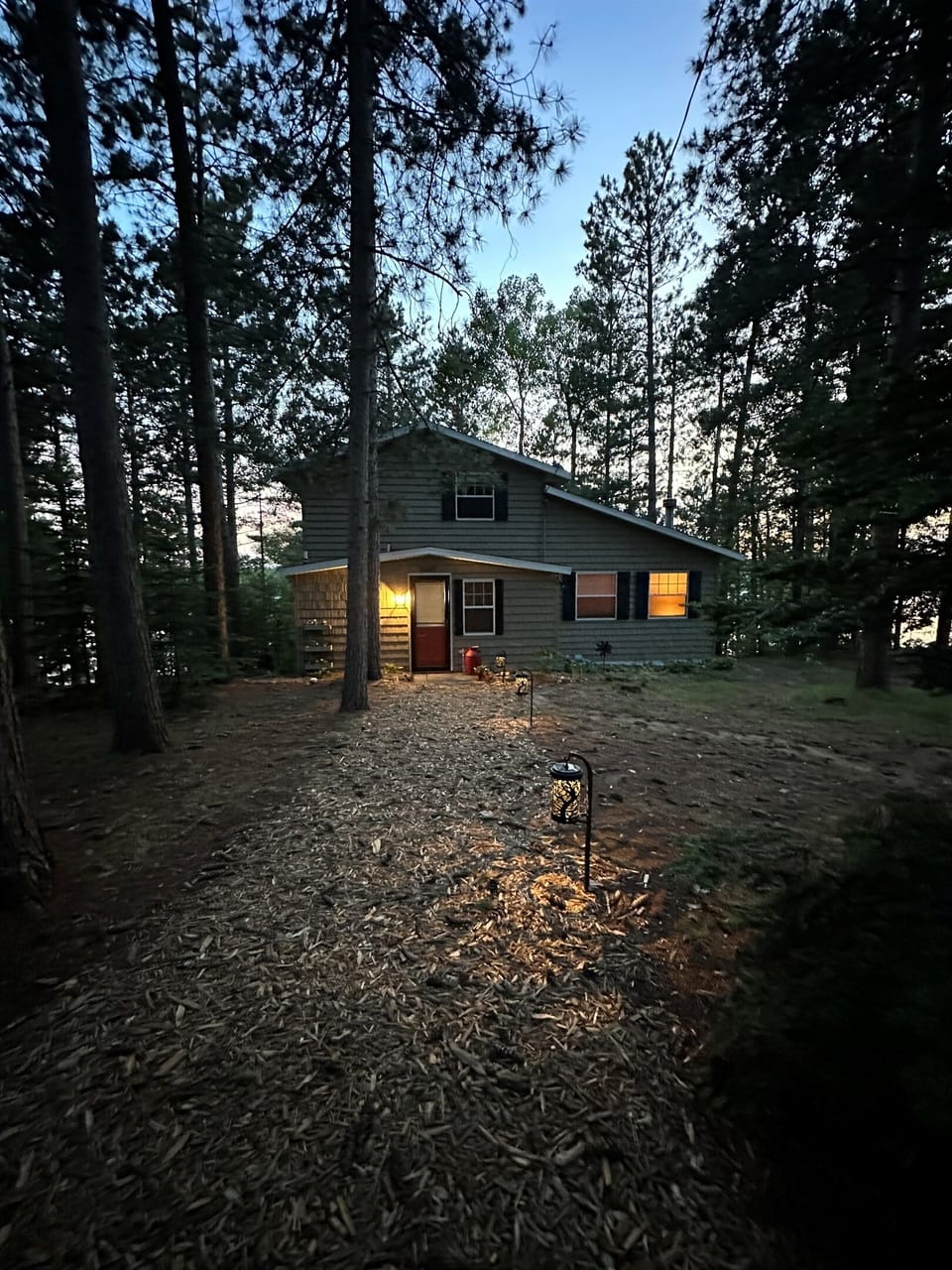 Tucked among red pines and overlooking the lake at golden hour, quiet, private, and just minutes from downtown and the Paul Bunyan State Trail.