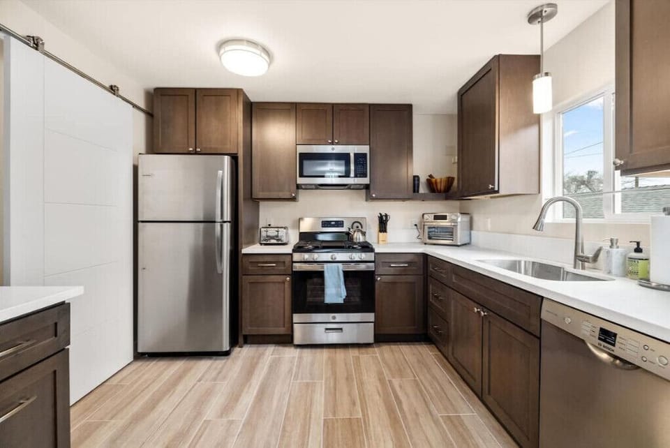 Kitchen with full-size refrigerator/freezer