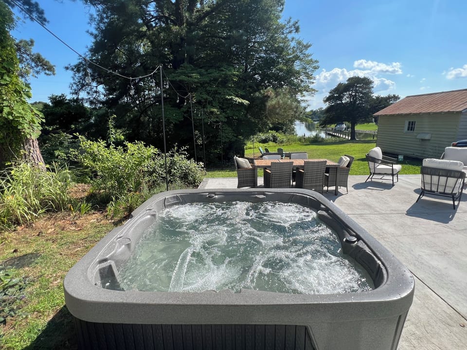 Relax in the hot tub while enjoying the water views!