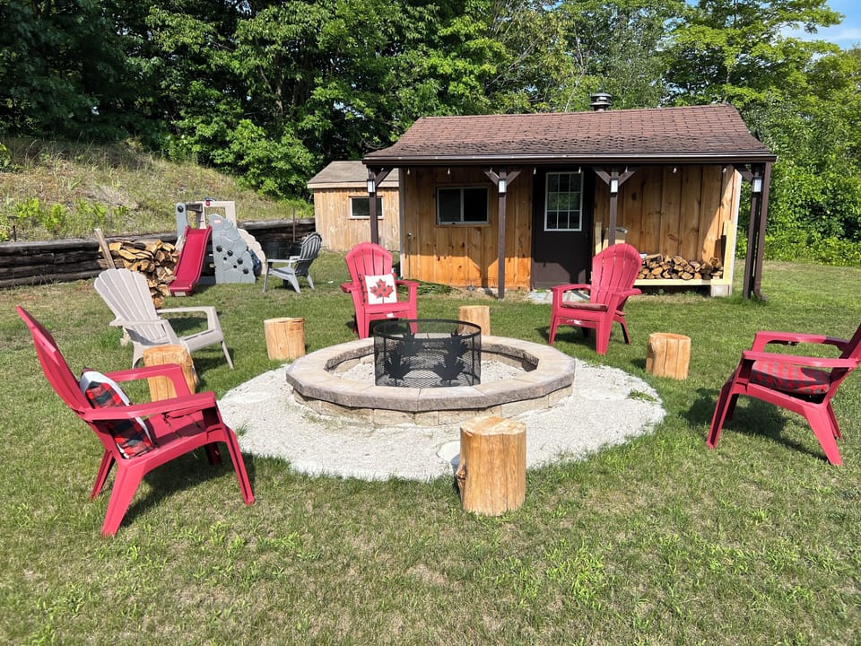 Huge, open backyard space with new fire pit and play area (not fenced)