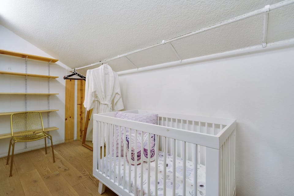 Master bedroom closet , baby crib is ready