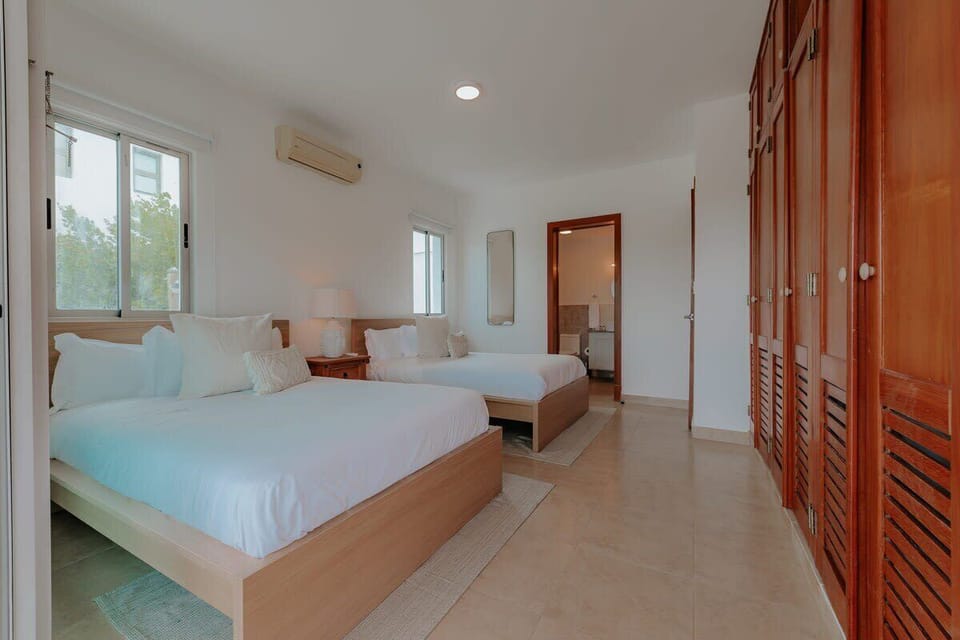 Two queen size bed,  air conditioner