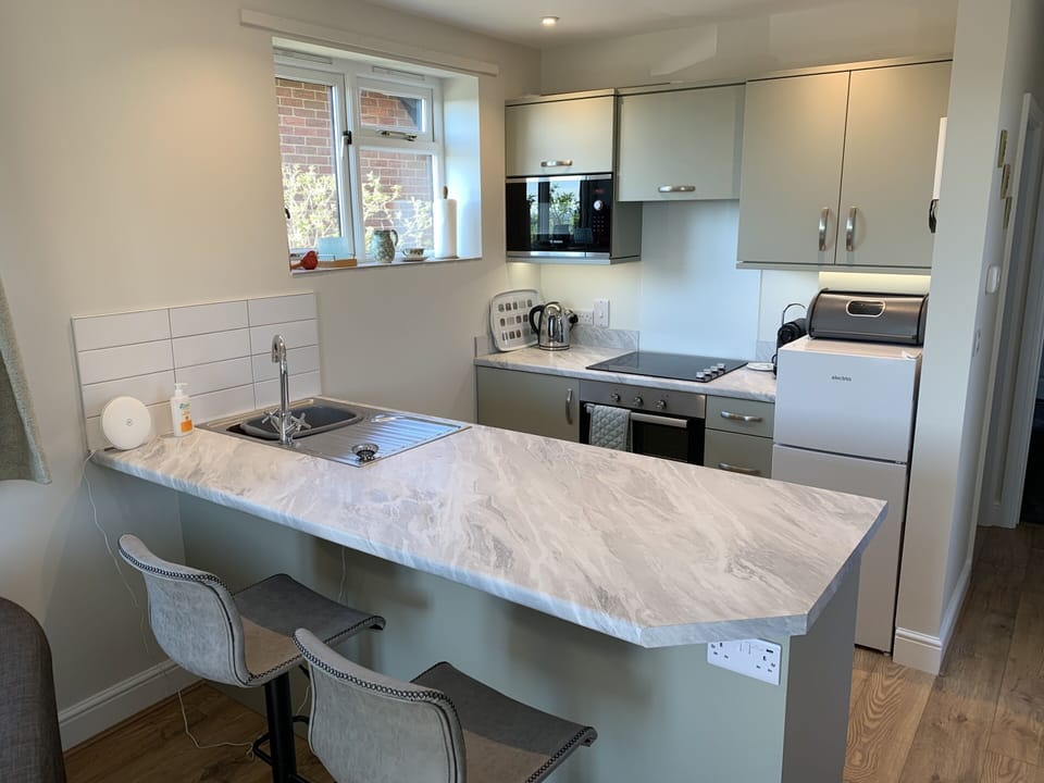 Breakfast bar and kitchen
