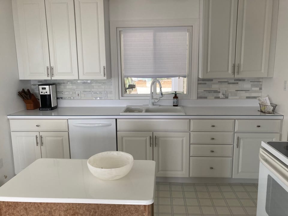 Kitchen with vintage work island.
